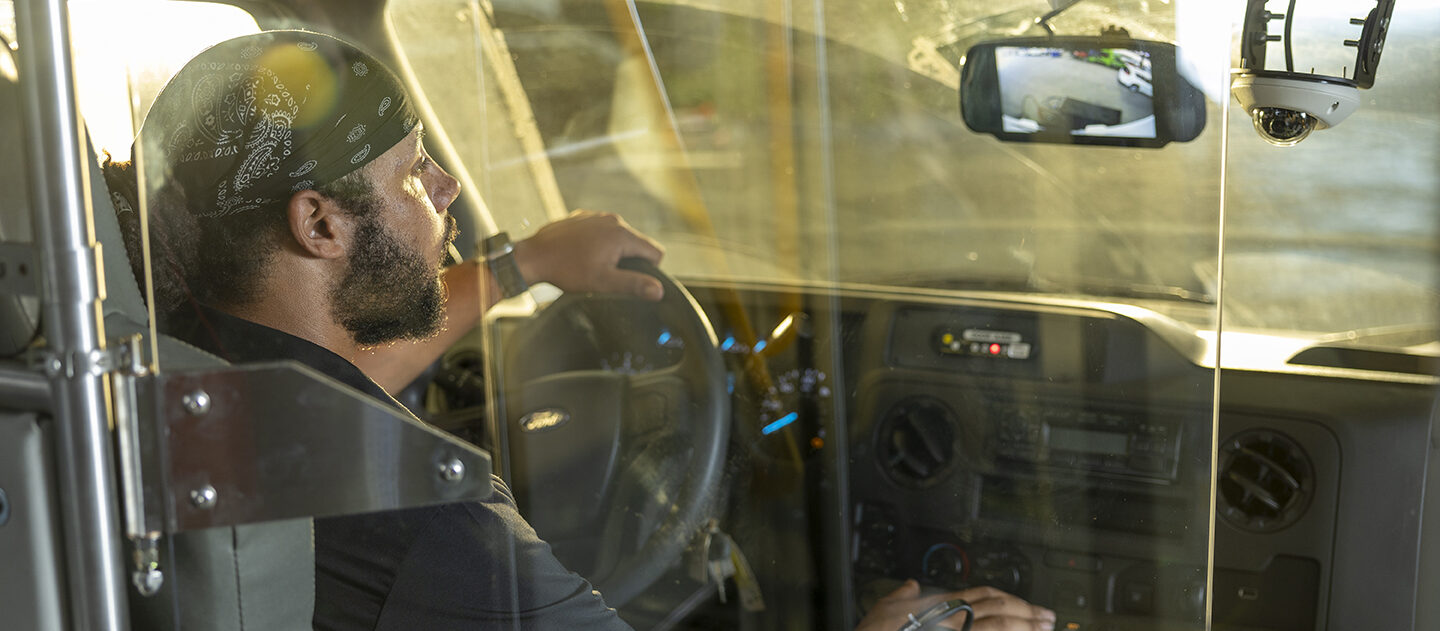 A bus driver with a driver protection kit